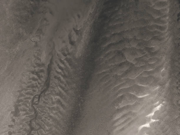 istock Monotone Of Sand Patterns With Sun Highlight 1361661087