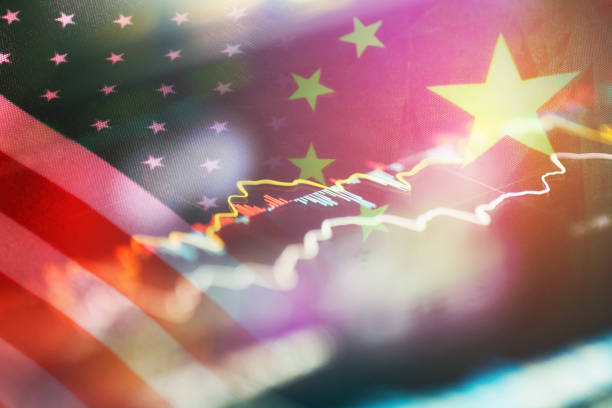 istock Chinese and American flags and financial stock data 1361663488