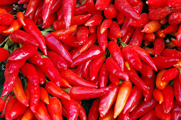 istock Red hot chili peppers background 136166388