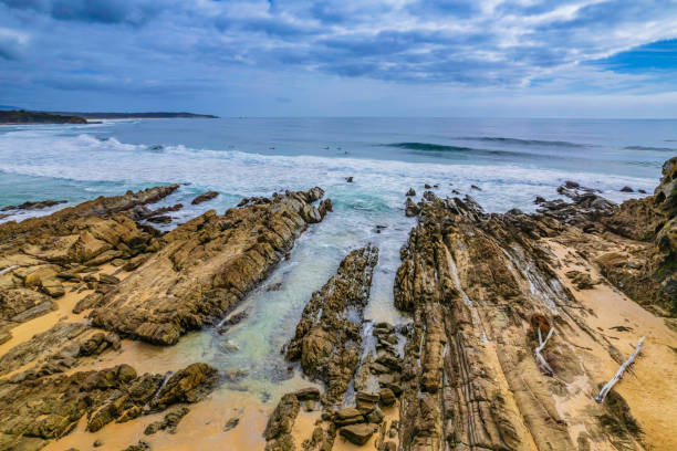 istock Morning ocean views with waves and rocks 1361668606