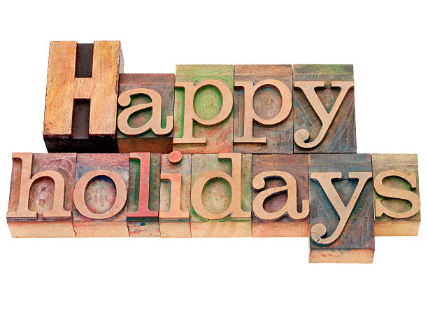 istock Wooden letter stamps spelling happy holidays 136166862