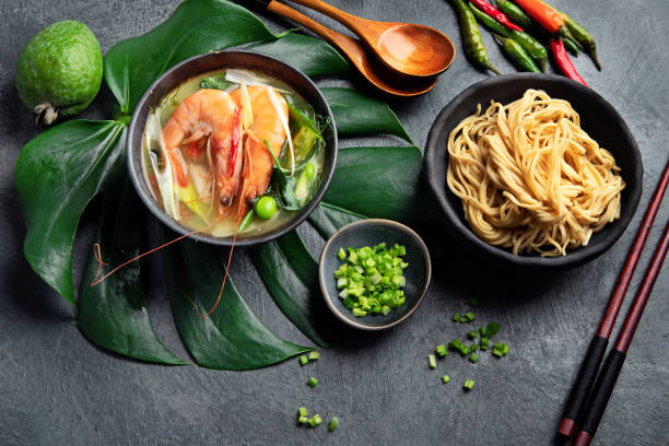 istock Green curry with chicken in bowl on dark background. 1361669433