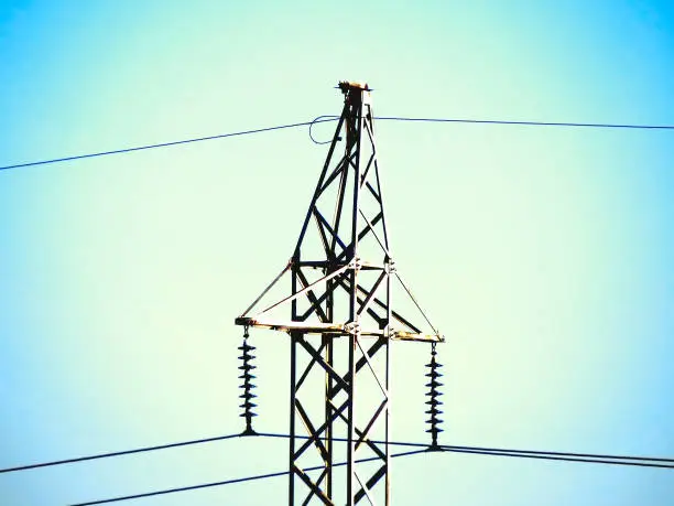 Toned Photo of Electrical Tower on the Sky background