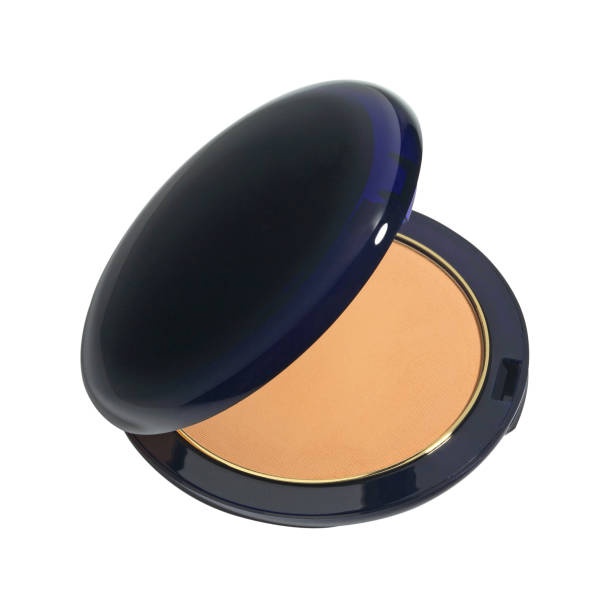 istock Dry face powder in round dark blue casket isolated on white 1361679152