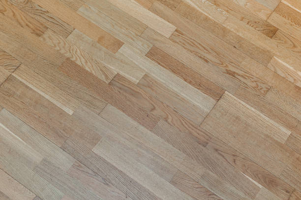 Scratched wooden floor surface from oak material background overhead view. Pattern and old wood texture.