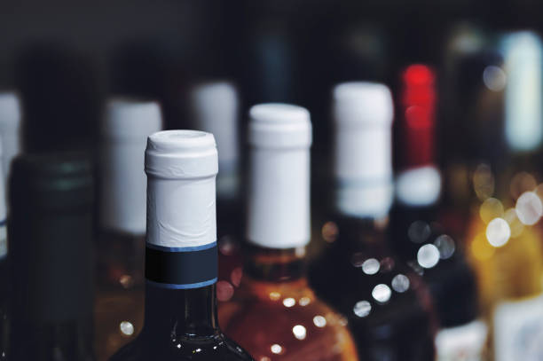 istock Many wine bottles on display in store 1361680850