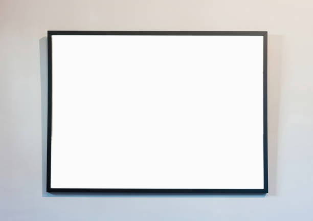 istock Empty frame on white wall background, copy space. Poster mockup. Black, modern, minimal border 1361682504
