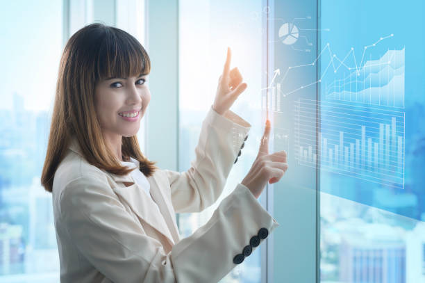 istock Young business woman hand touching on virtual screen 1361685479