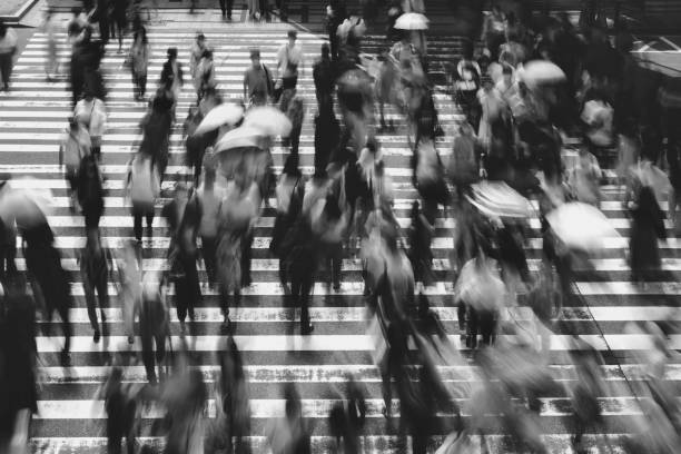 istock Many people crossing Osaka in Japan 1361687167