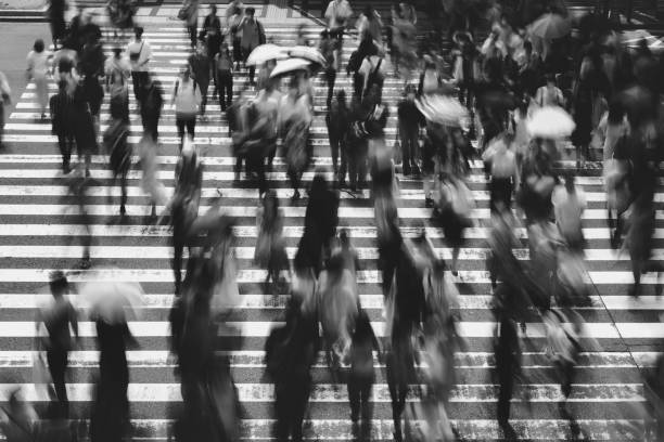 istock Many people crossing Osaka in Japan 1361687188
