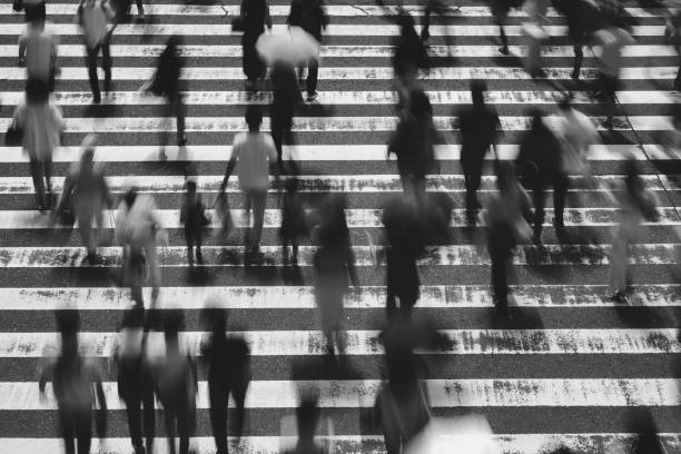 istock Many people crossing Osaka in Japan 1361687272
