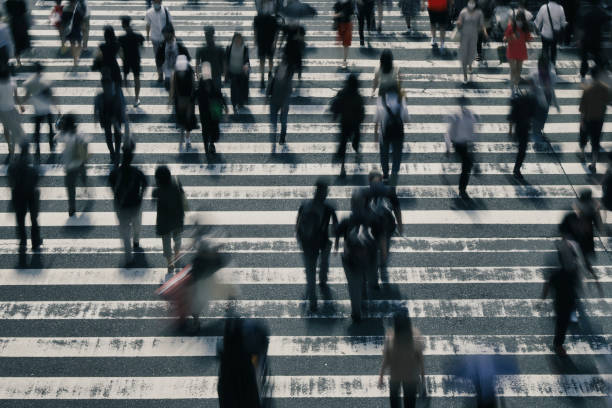 istock Many people crossing Osaka in Japan 1361687581