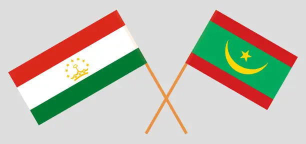 Vector illustration of Crossed flags of Tajikistan and Mauritania. Official colors. Correct proportion