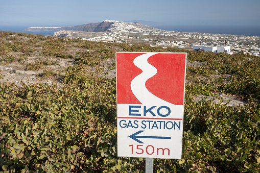 Sign to EKO Petrol Station in Pyrgos Kallistis on Santorini in South Aegean Islands, Greece