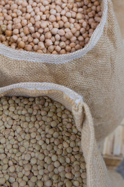 istock Burlap sack with raw lentils seeds 1361695189