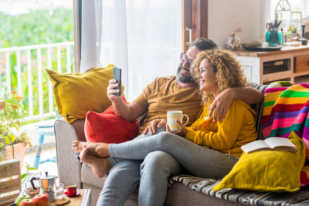istock Woman Sitting On Sofa At Home 1361697067