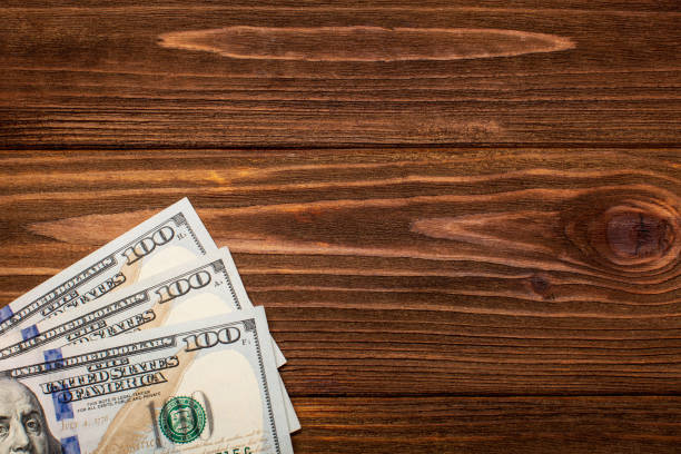 istock Hundred dollar bills background. Money concept 1361700341