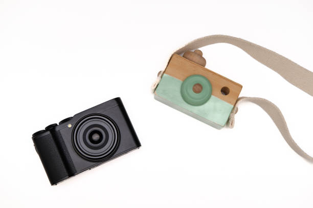 istock modern camera and toy camera to illustrate the evolution in the camera industry 1361703005