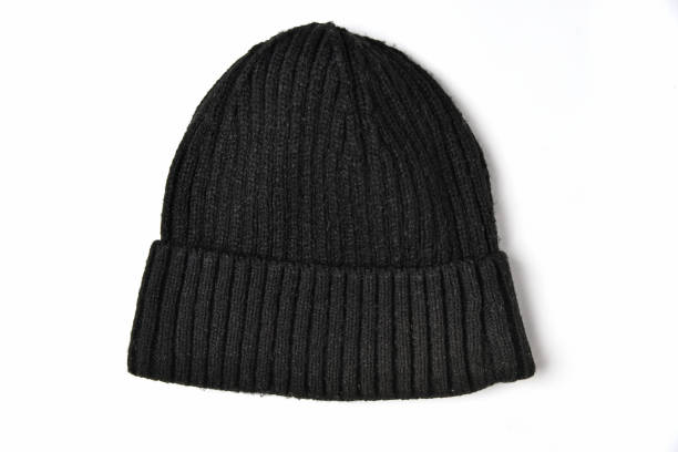 istock Black knitted winter hat on a white background isolated. 1361703191