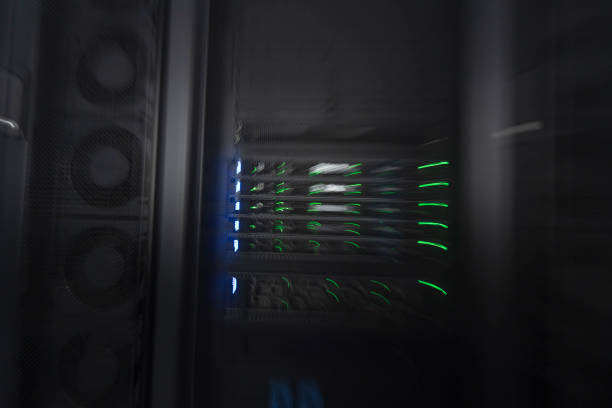 istock server room or data center supercomputer technology equipment, abstract close up of a server rack with motion blur. 1361704122