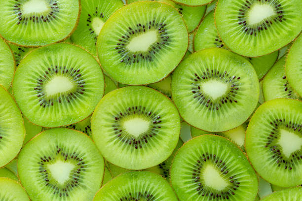 istock Kiwi Macro,Fresh Kiwi fruit sliced use for background 1361708719