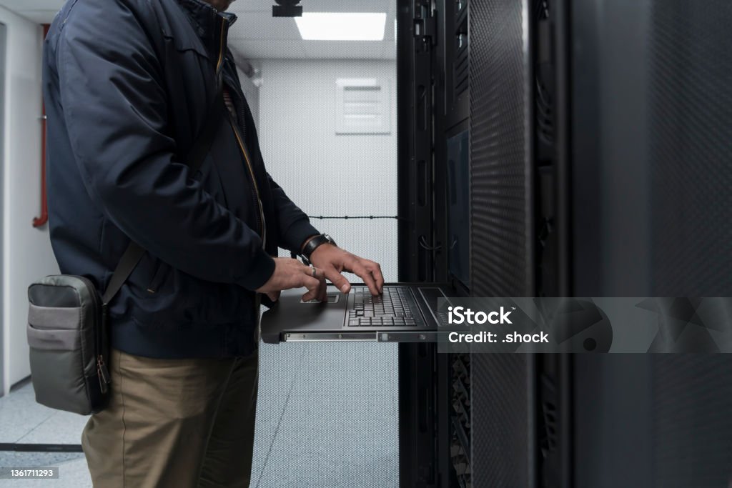 Engineer With Keyboard Close Up On Data Center Engineer Hands Using Keyboard On A ...