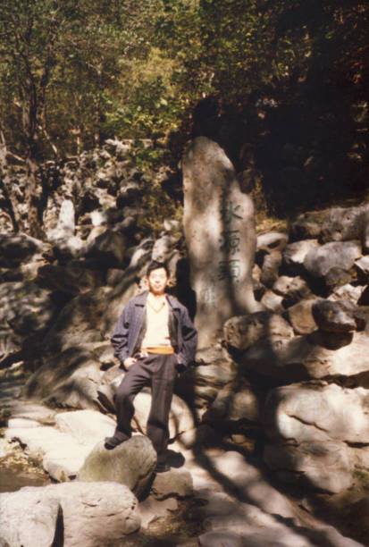 istock 1990s Chinese Men Real Life Old Photo 1361714610