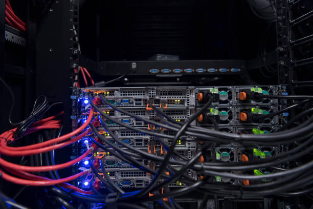 istock network server room closeup on fiber optic hub or switch for digital communications and internet in mainframe corporate business data center supercomputer. 1361716191