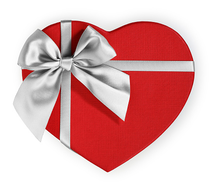 Heart shaped gift box with red ribbon isolated on white background\nFor Valentine's Day