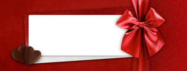 valentines day gift card, heart shaped chocolates with red shiny ribbon bow and white ticket for copy space isolated on red glittering background, top view and also great for mother's day greetings tarjeta de regalo del día de san valentín, chocolates en forma de corazón con lazo de cinta roja brillante y boleto blanco para el espacio de copia aislado sobre fondo rojo brillante, vista superior y también ideal para los saludos del día de la madre
