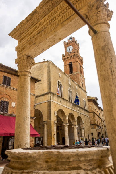 istock Clock tower in a small square, Tuscany, Italy. 1361719289
