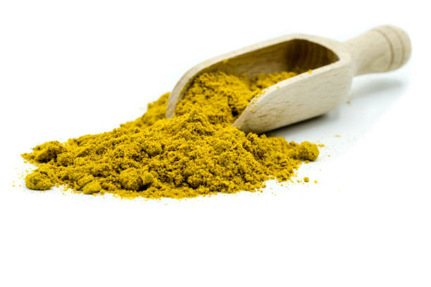 istock Curry powder isolated on white background 1361721730