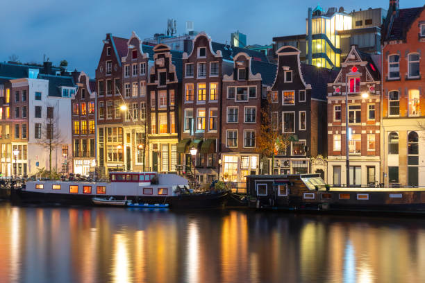 istock Amsterdam canal Amstel with dutch houses 1361722168