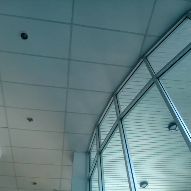 istock building ceiling. lights placed on the ceiling of the building 1361724964