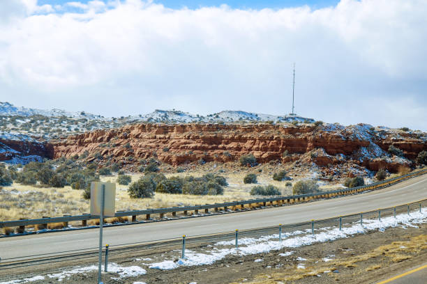 istock I-40 highway snow covered valley on overcast day in New Mexico 1361725008