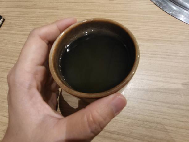 istock A cup of hot tea on a wooden table 1361725584