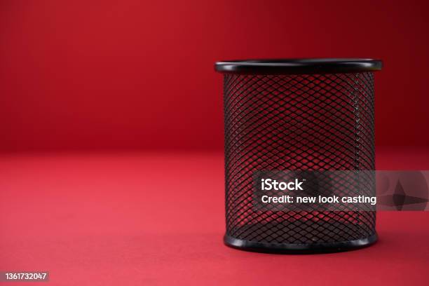 Wire Trash Can On Red Background Stock Photo - Download Image Now - Garbage Can, Wastepaper Basket, Aluminum