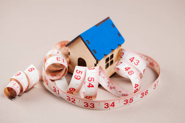 istock measuring tape and house 1361738191