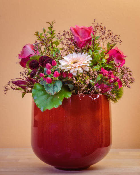 istock Flower bouquet in a red vase 1361746449