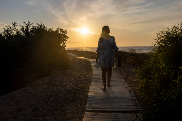 istock Sad woman leaving everything behind 1361747644