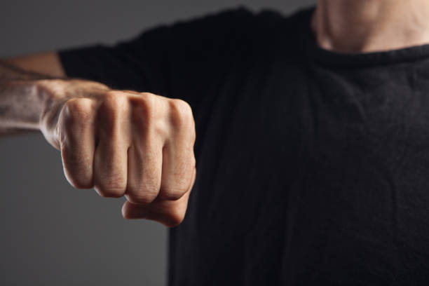 istock man shows fist 1361747733