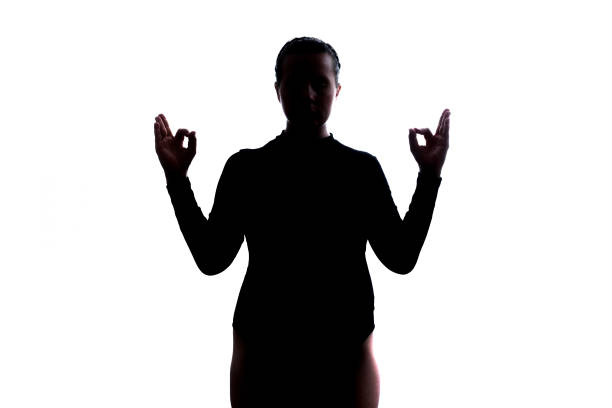 istock Young woman meditating showing mudra gesture with fingers. 1361748090