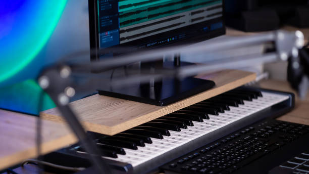 istock Modern synthesizer MIDI keyboard in Home Music studio. 1361752894