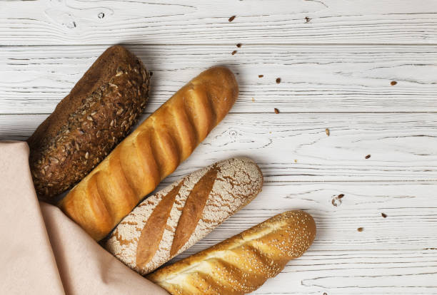 istock fresh baked bread on wooden 1361753118