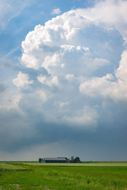 istock Large storm cloud over a farm on the plains 1361758167