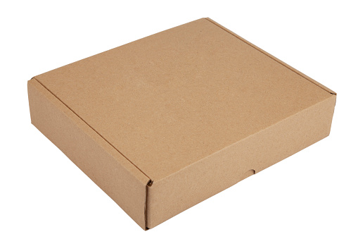 Isolated shot of blank old cardboard box on white background