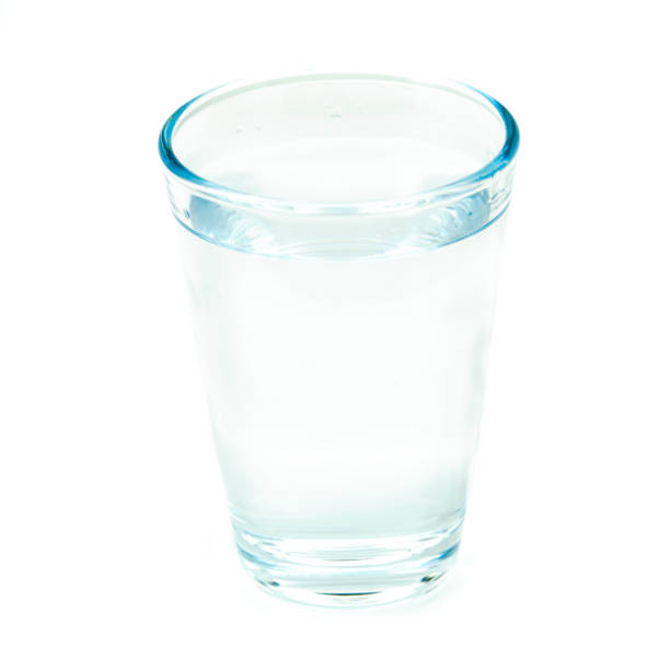 istock Water in glass on white background 1361759450