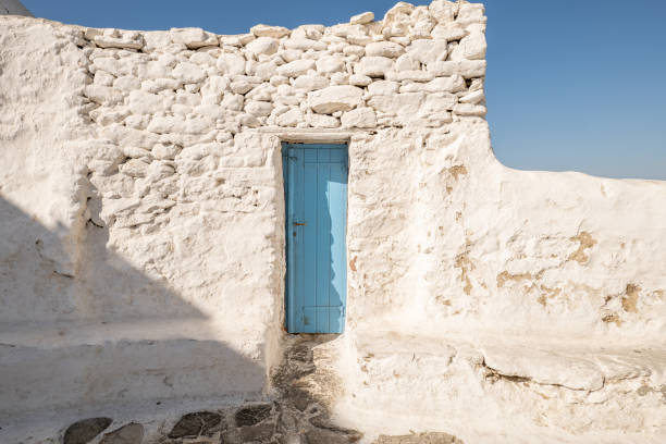 istock Blue door on white wall in Mykonos, Greece 1361764011