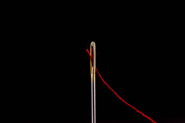 Threading sewing needle