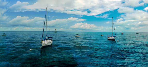 Panoramic view of the coral reefs under the boats off Key Largo, FL, USA stock photo